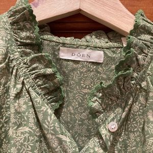 Button down short sleeve, victorian style.